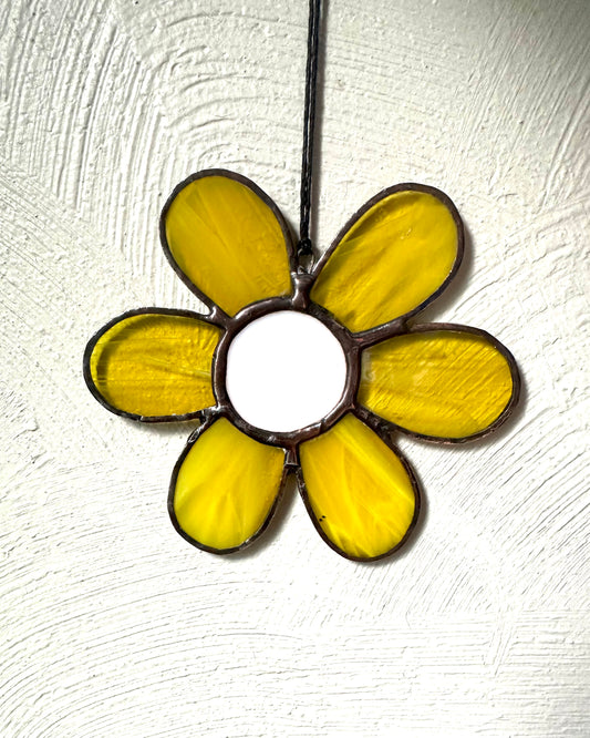 Yellow and white glass flower