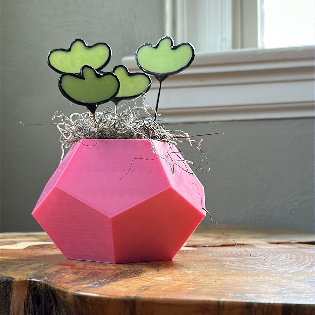 Pink 3D planter with four green glass stems